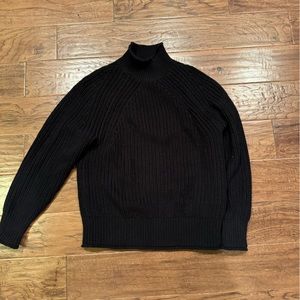Black turtleneck knitted sweater. Tag still on.